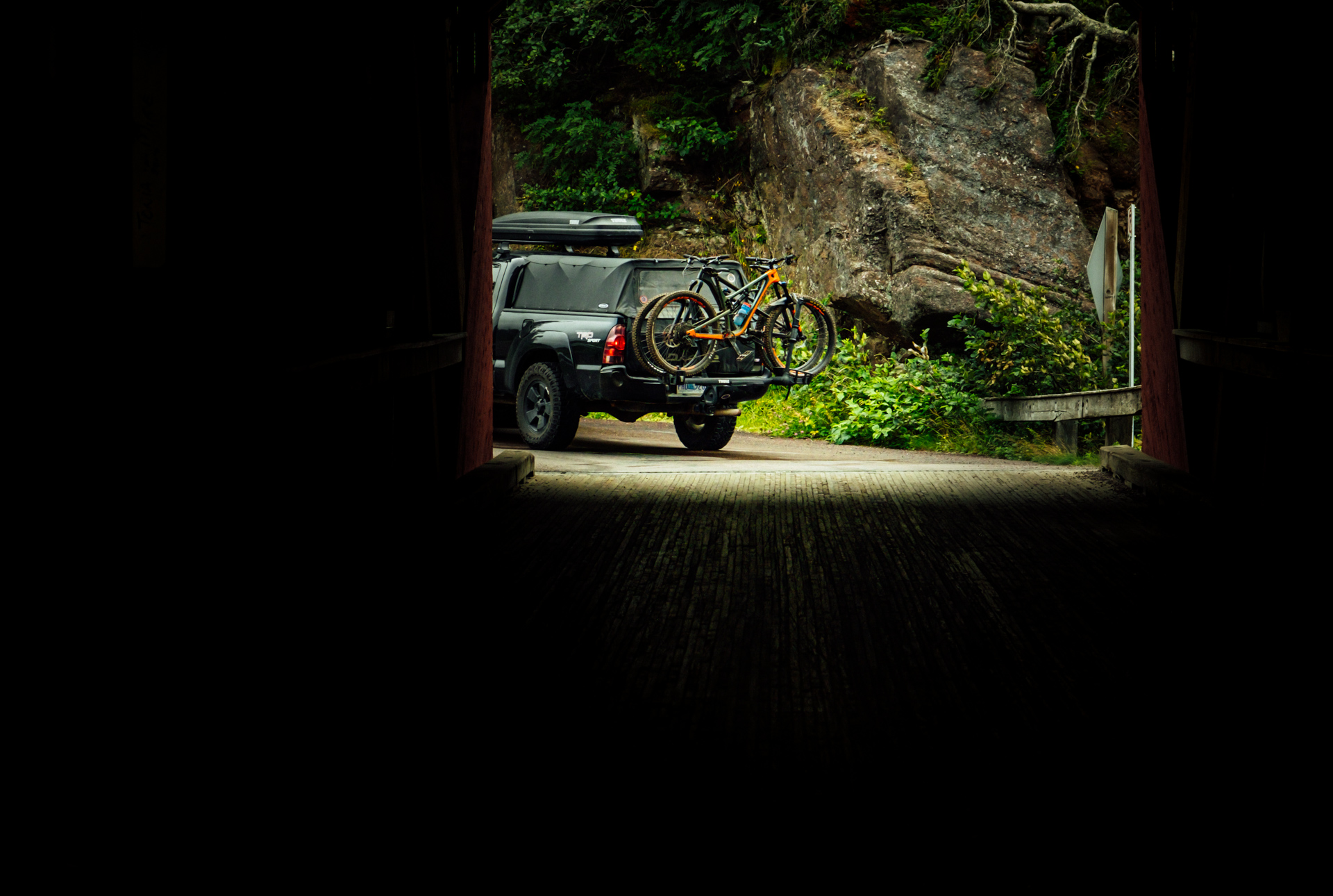 Driving through one of New Brunswicks famous covered bridges with Mountain Bikes in tow.